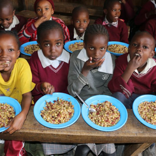 Kenya, Nairobi, 30 March 2017WFP has run a school meals programme since 1980, working with Kenyas Ministry of Education. This provides nutritious meals to 1.5 million children in the most food-insecure districts. Since 2009, the government-led home grown school meals programme has bought food from local farmers, helping support educational achievement at the same time as stimulating the local economy.In the Photo: School children enjoy a lunch made with salvaged vegetables. Vegetables previously thrown away purely for their looks are being transformed into nutritious school meals in Kenya.Photo: WFP/Martin Karimi